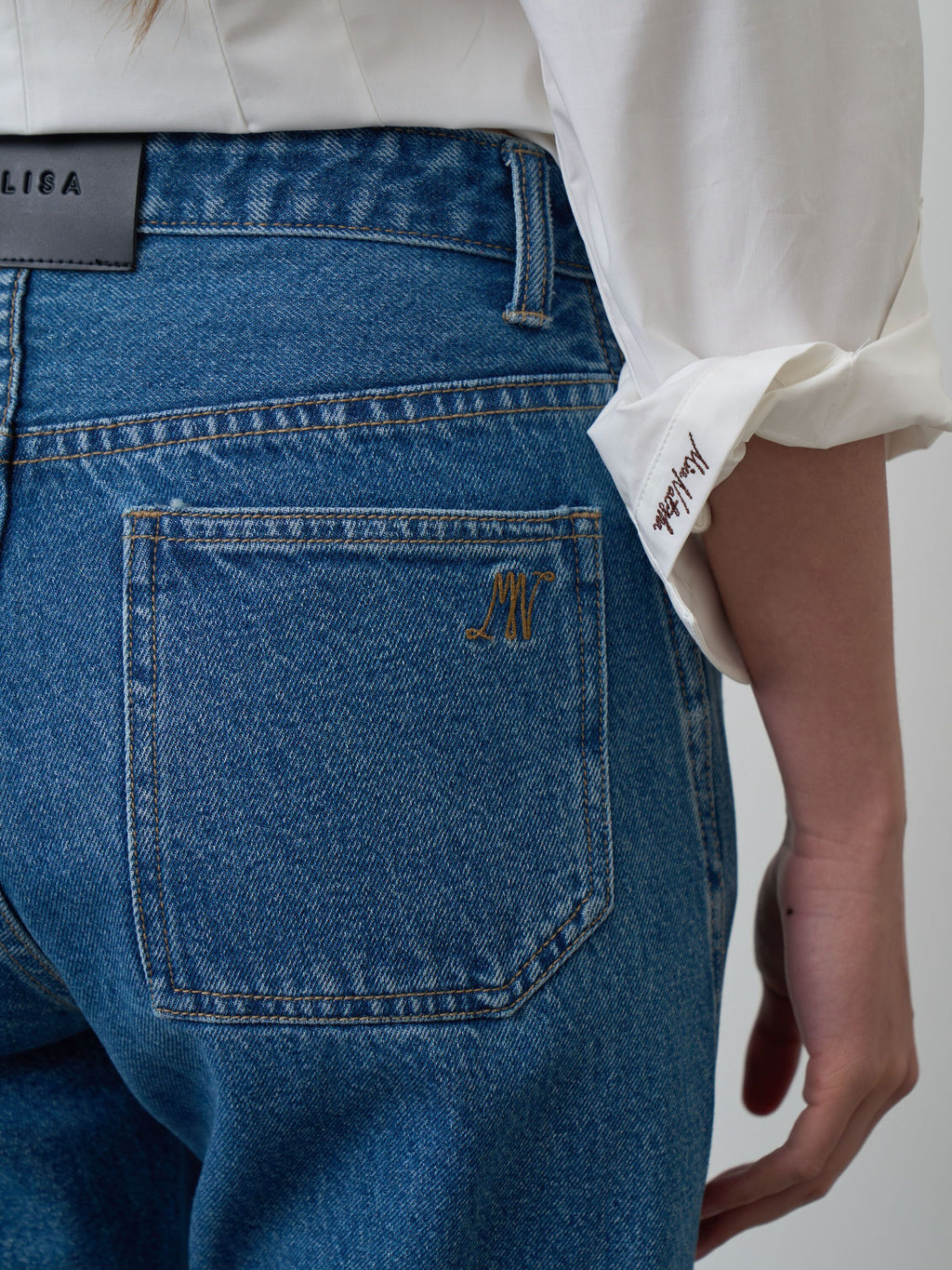 TWIST FLARE JEANS MN FW26